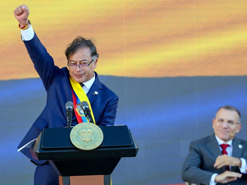 President Gustavo Petro of Colombia raises a fist in celebration